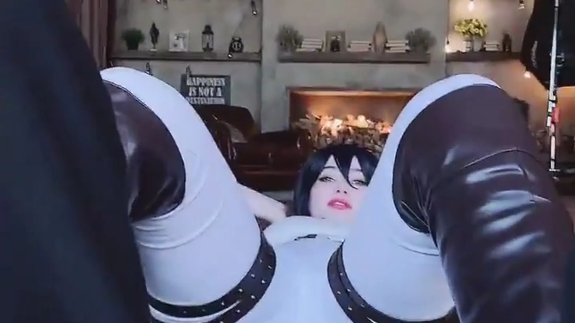 Alina Becker teasing her booty in latex boots