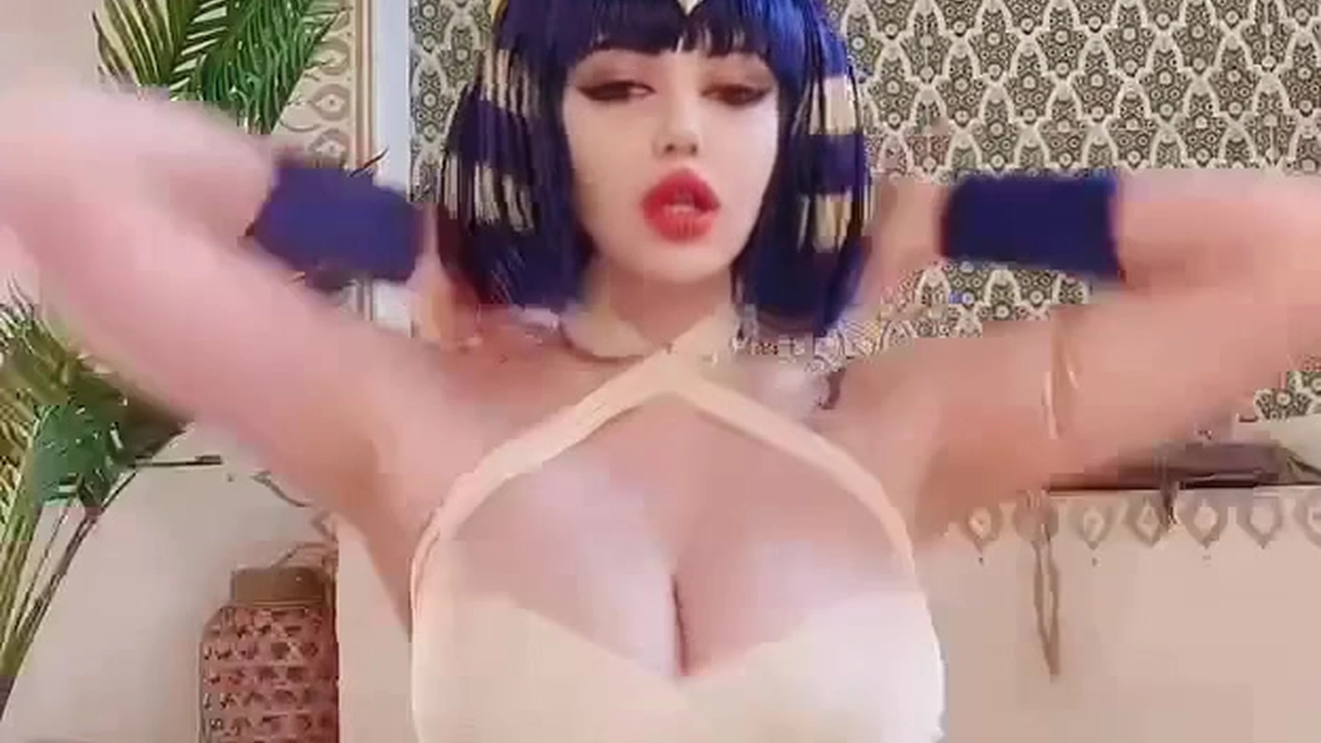 Alina Becker teasing her big tits in egyptian goddess cosplay