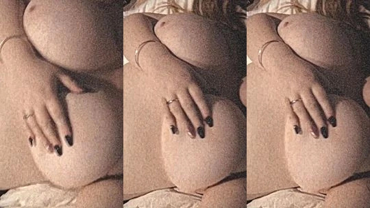 hot Australian chick Lara Rose teasing her naked big boobies lying in bed