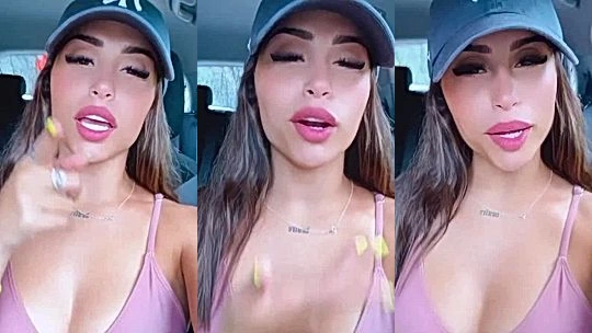 Angela Alvarez teasing her big tits in the car