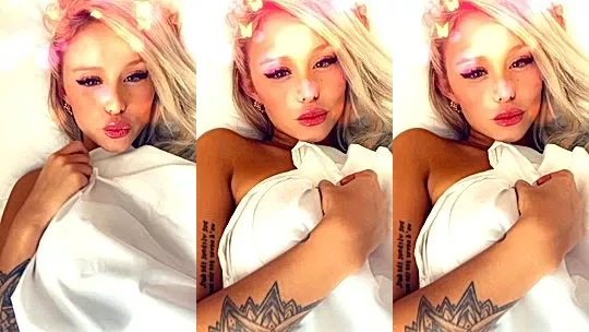 Agusanon teasing her naked body under the bedsheets