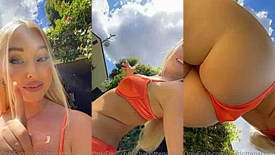 Charlotte Parkes teasing her big booty in orange bikini