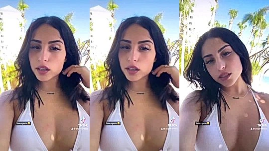 Angela Alvarez tesaing her big tits in white bikini