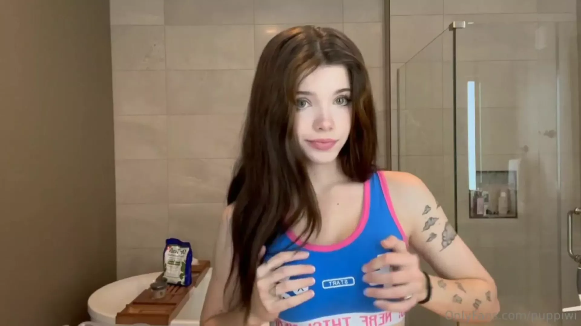 Puppiwi playing with her perky tits in the bathroom