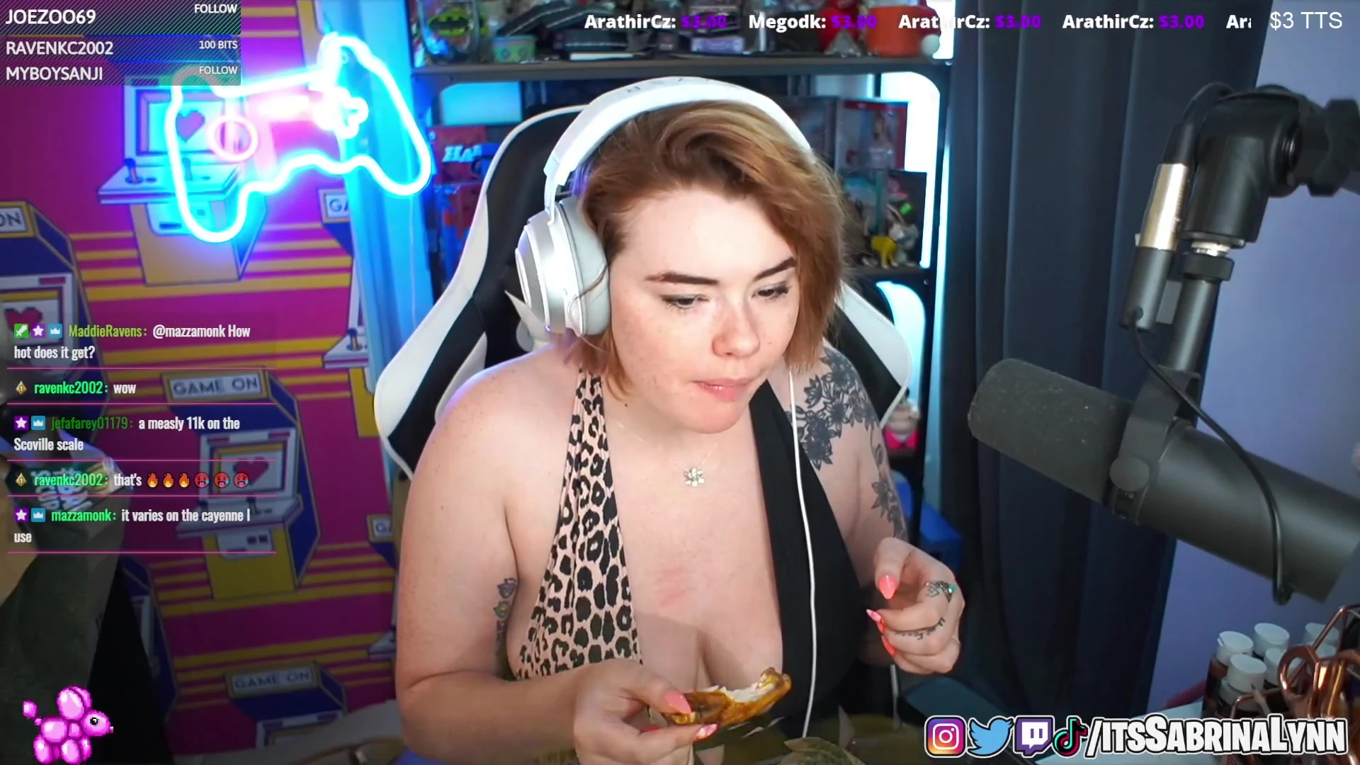 Sabrina Lynn teasing her big tits while eating dinner online