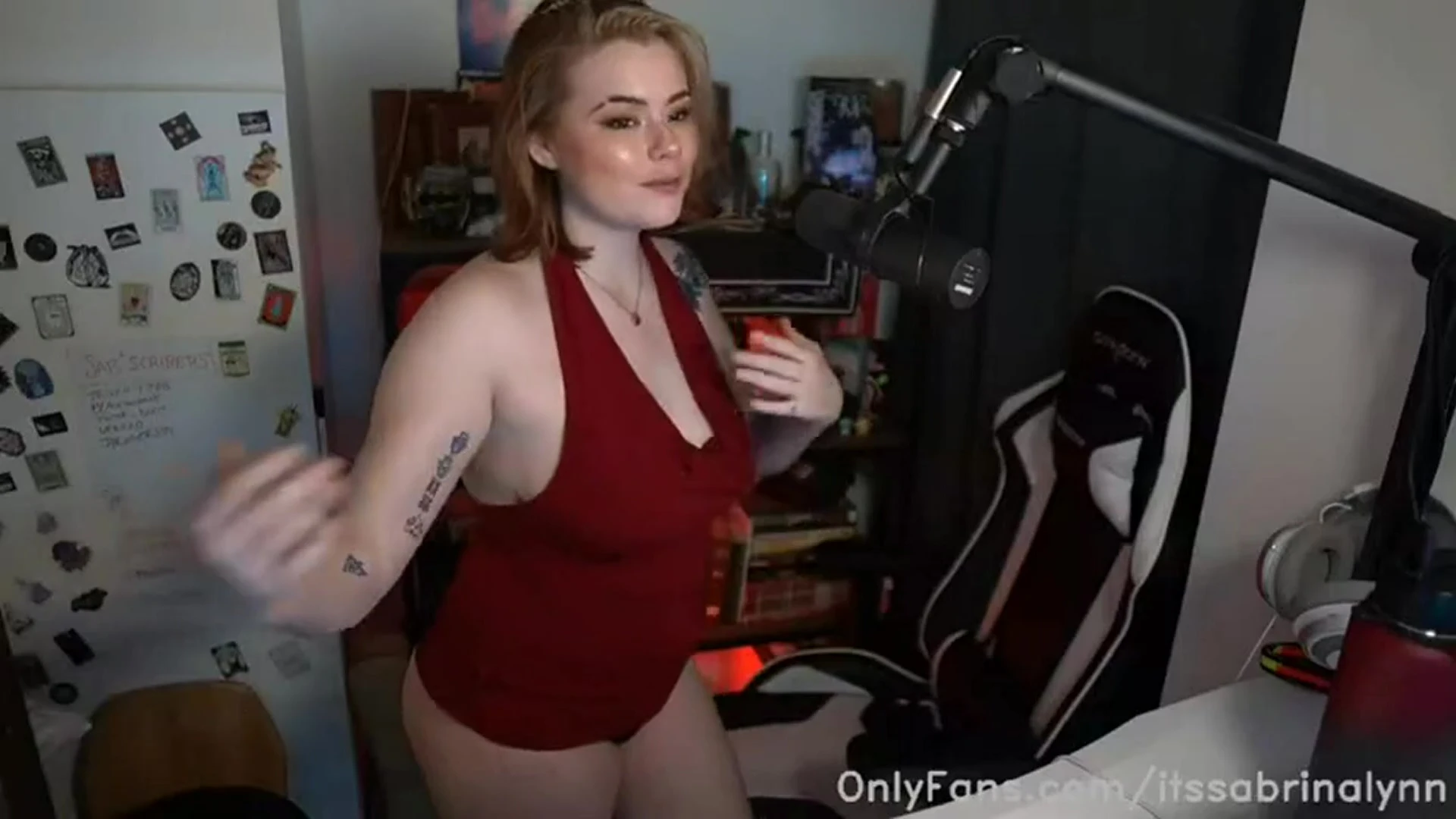 Sabrina Lynn teasing her naked tits with nipple pasties on podcast