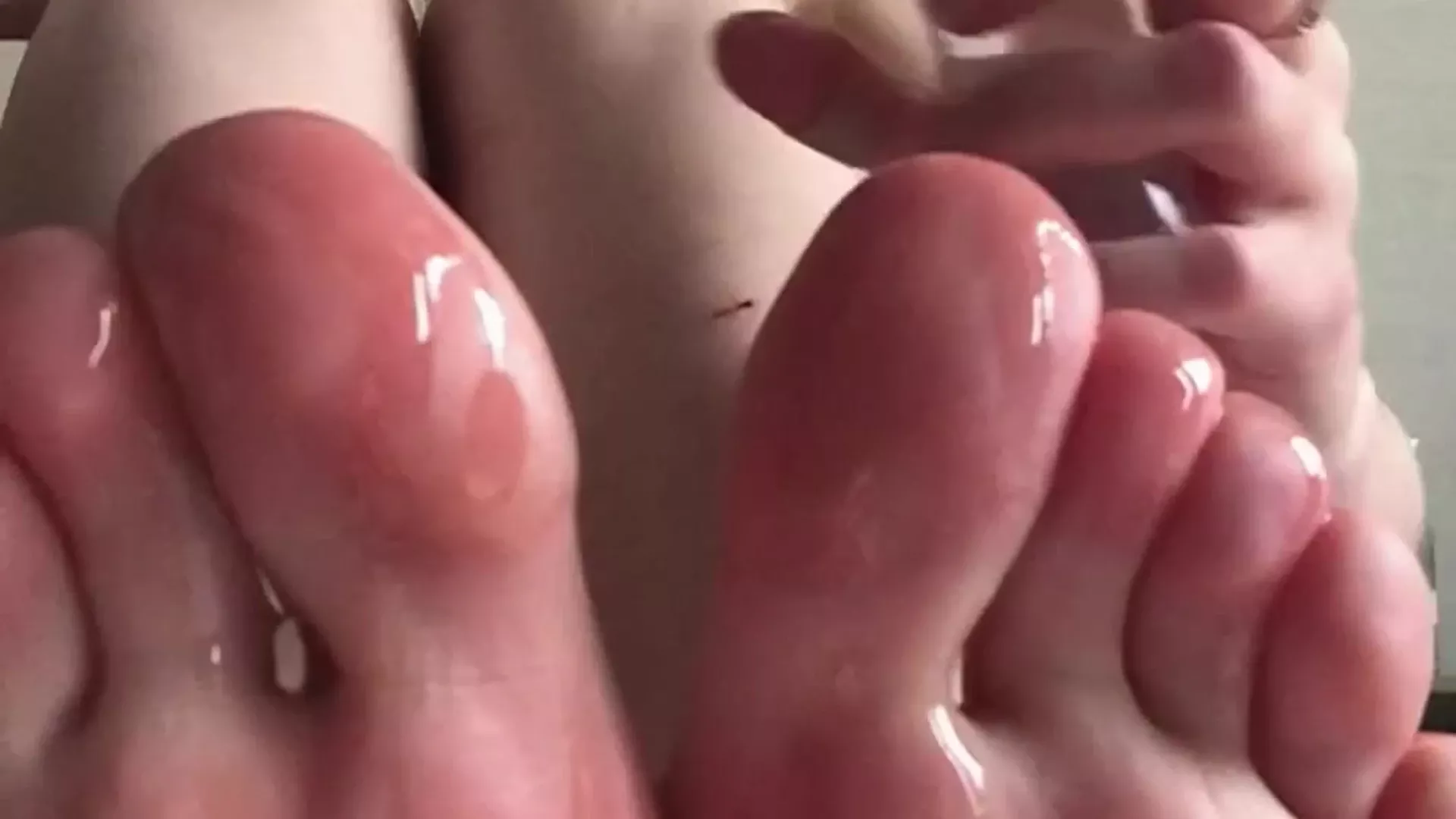 Freya Mayer teasing her oiled-up toes