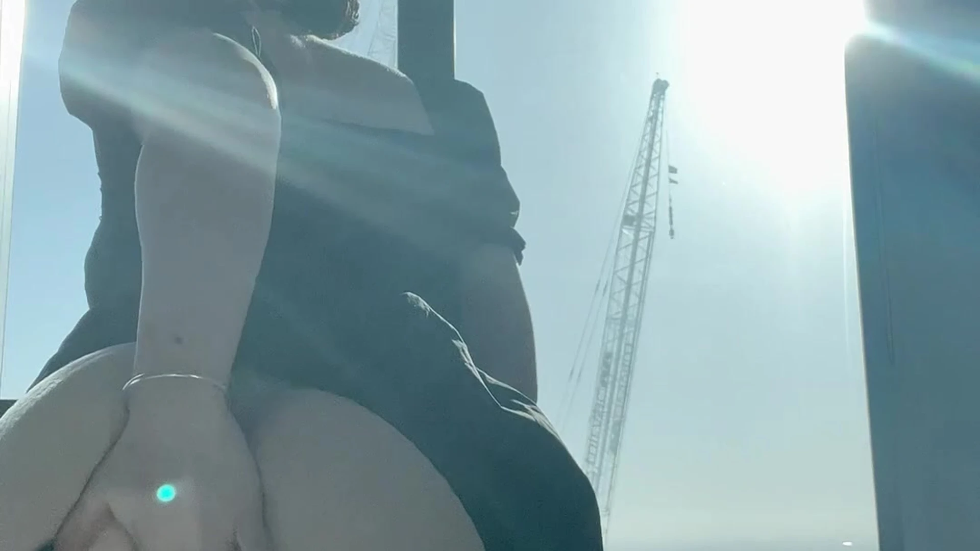 Lara Rose teasing her naked pussy by the window sill