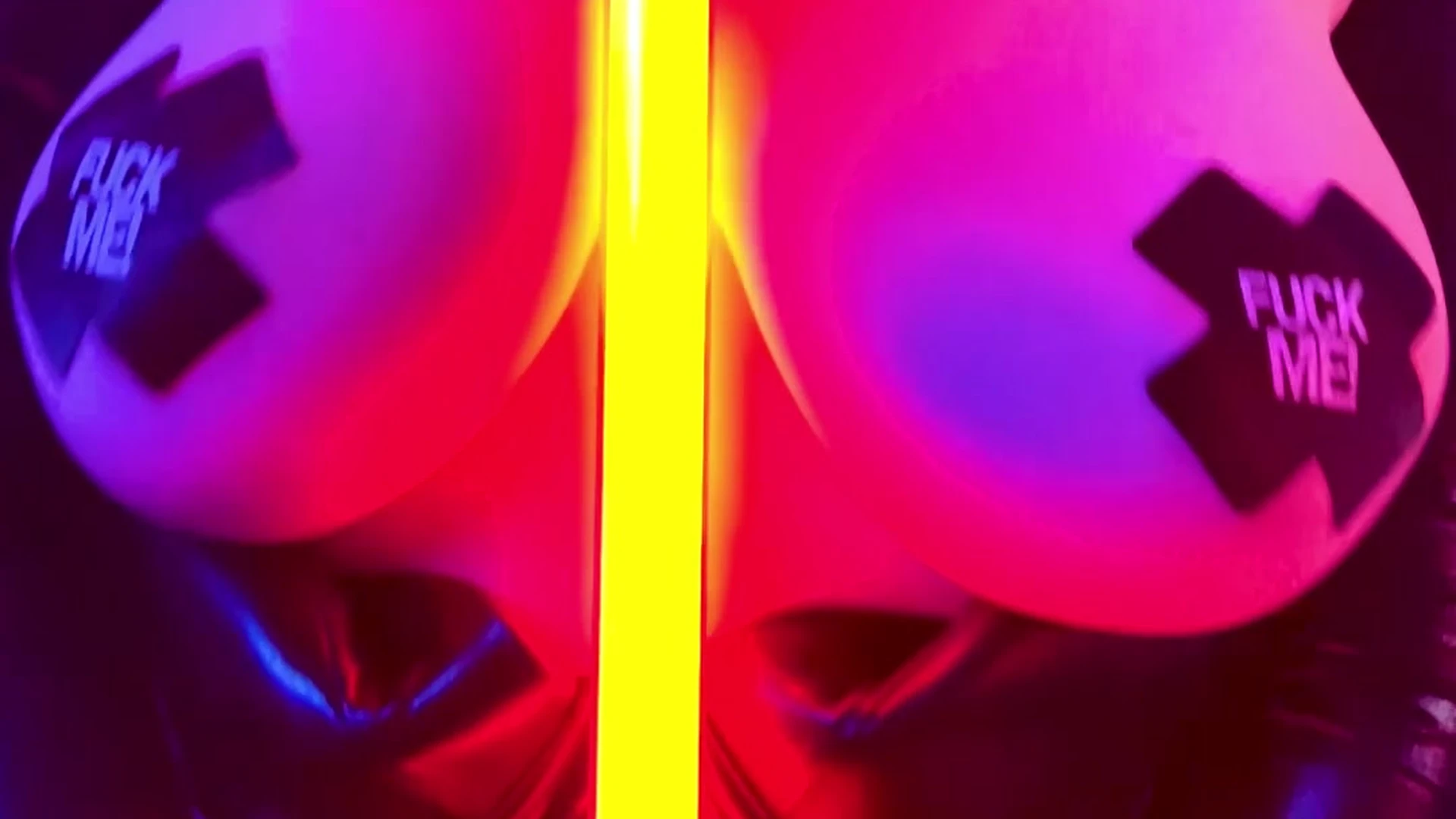 Sabrina Lynn teasing her big tits with a neon stick