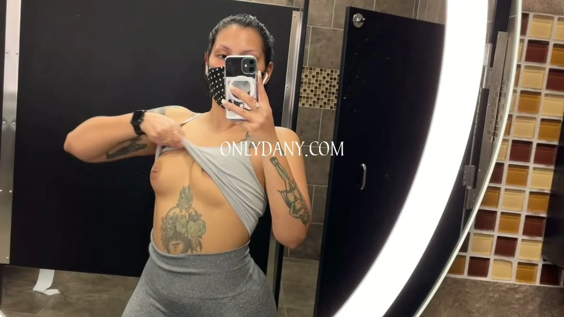 OnlyDany flashing her naked tits after a gym session