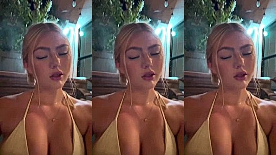 hot blonde chick Hailey Sigmond teasing her big tits in the hot tub