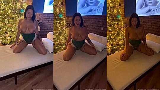 Chromazz teasing her naked huge breasts for chriastmas