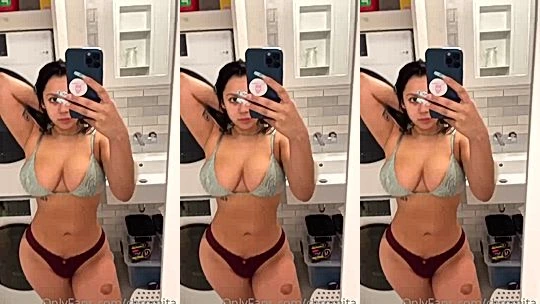 Chromazz teasing her huge breasts in laced lingerie
