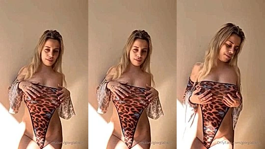 blonde babe giorgiababy teasing in her leopard see-through lingerie