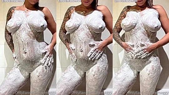 Nomaggy soaping up her naked body in the shower