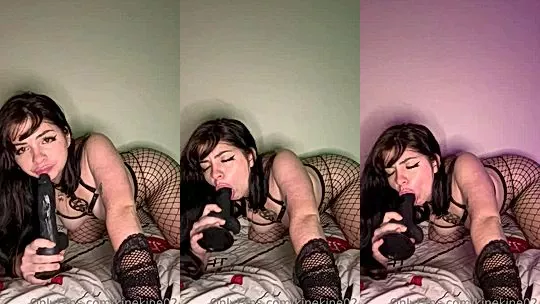 hot latina Kinekine02 sucking on a big black dildo