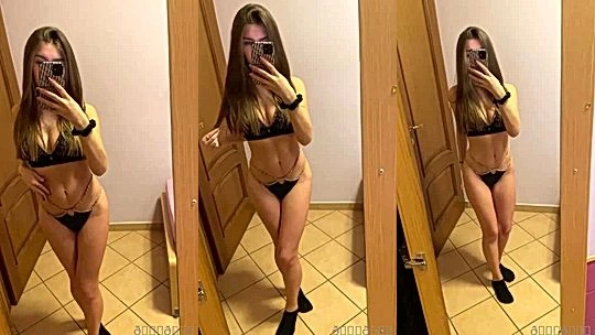 Elisa Esposito showing off her new lingerie in the mirror