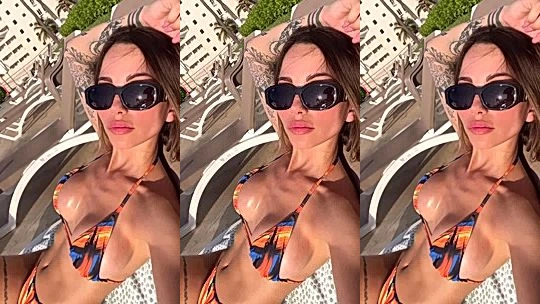 hot latina chick Melanie Pavola sunbathing her hot bikini body