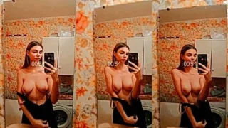 Anneth Dmitrieva teasing her naked tits in the kitchen