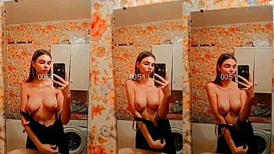 Anneth Dmitrieva teasing her naked tits in the kitchen