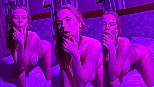 Nastya Xolod teasing her sexy naked body lying in bed