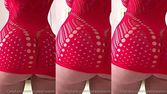 Niykee Heaton teasing her round ass in red tight dress