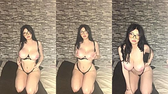nerdy slut Layla Dream showing off her naked big boobies