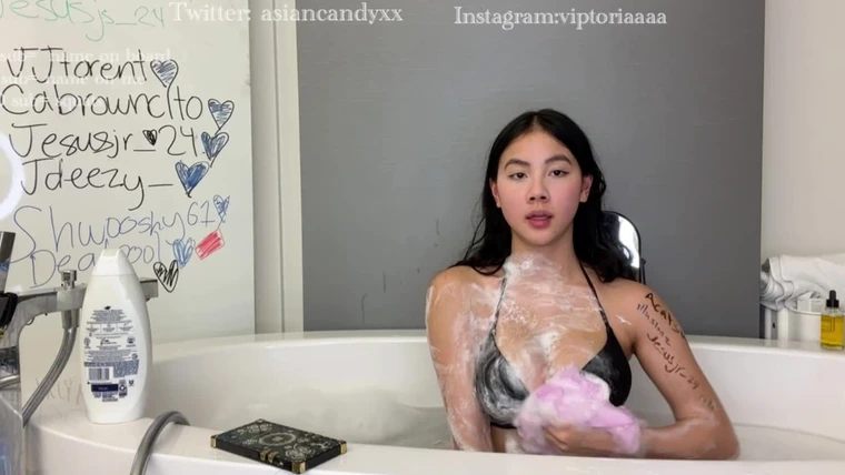 Asian.candy teasing in the tub on camshow