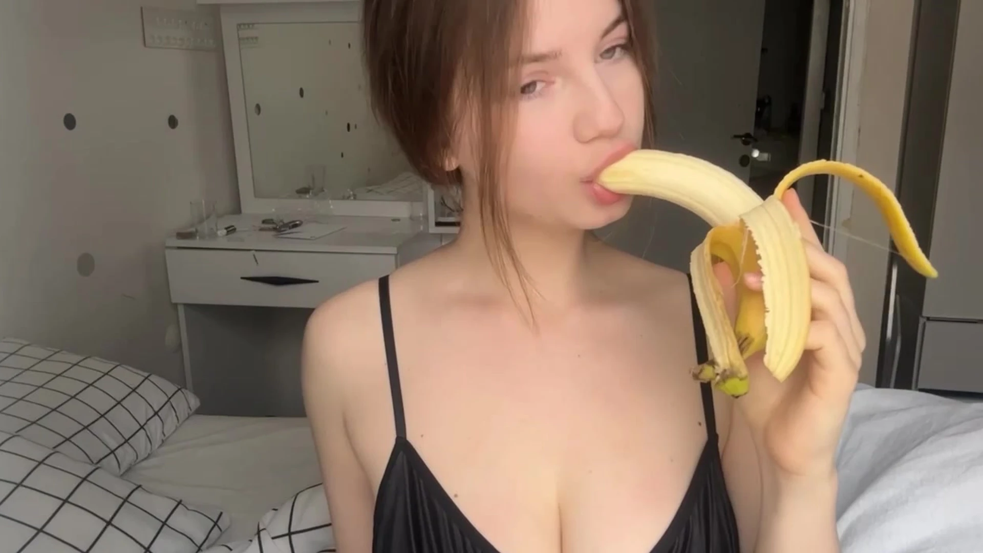 Devdaria seductively eating a banana