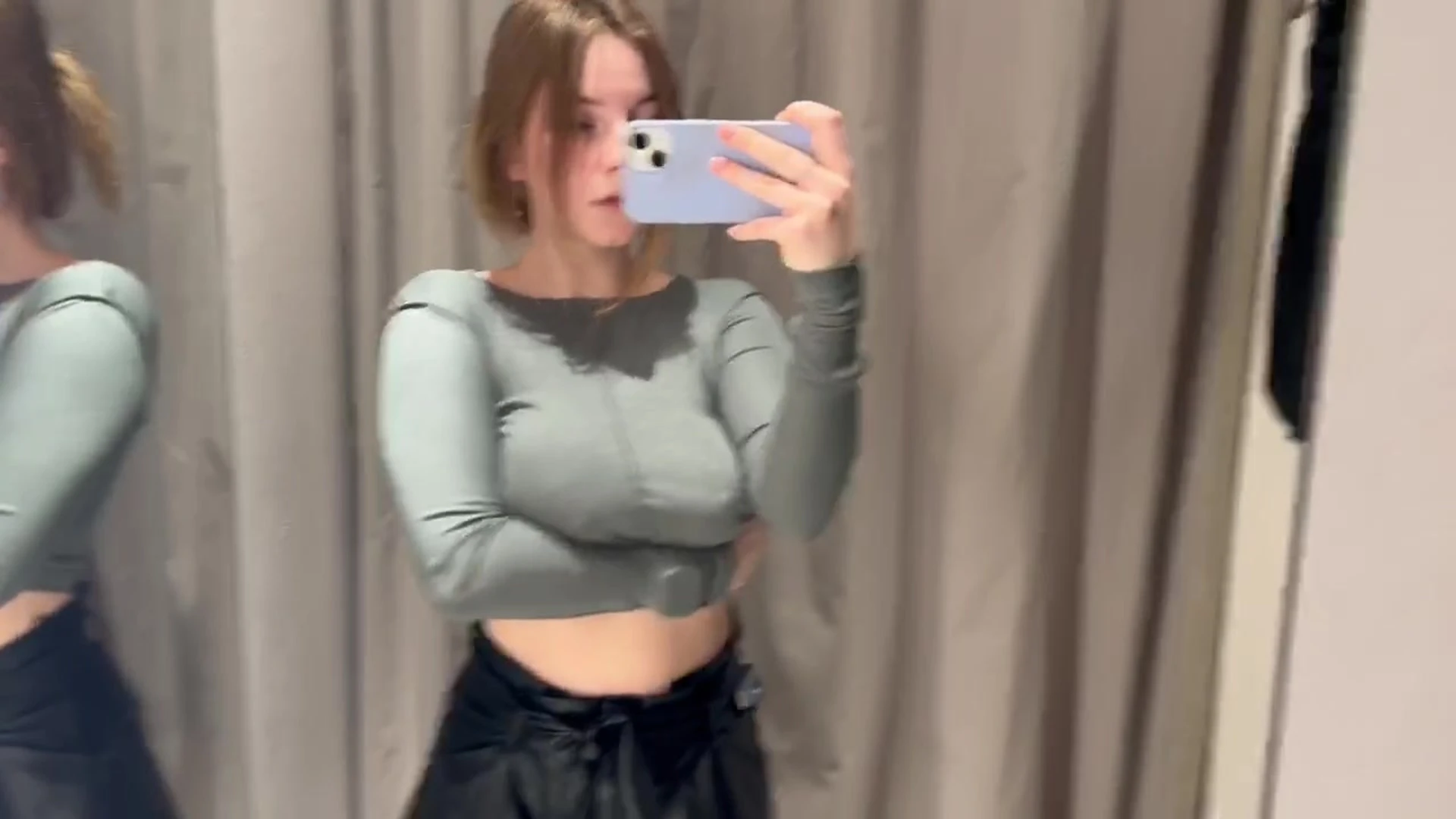 Devdaria playing with her braless big tits in the dressing room